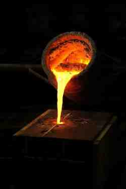 Hot Liquid Metal being poured into Casting Custom Metal Castings